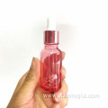 Pink essential oil glass dropper bottles